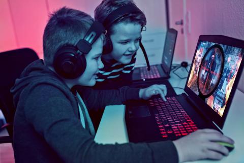 Kids playing competitive esports games