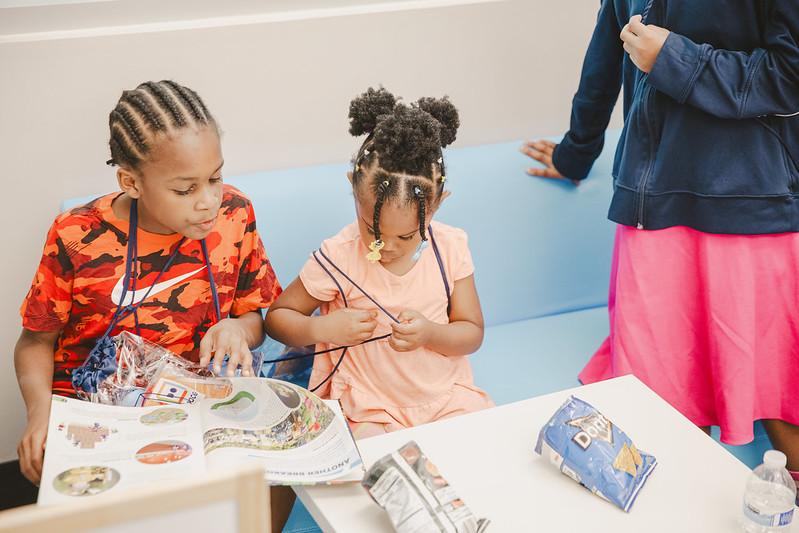 Photo of kids playing with technology