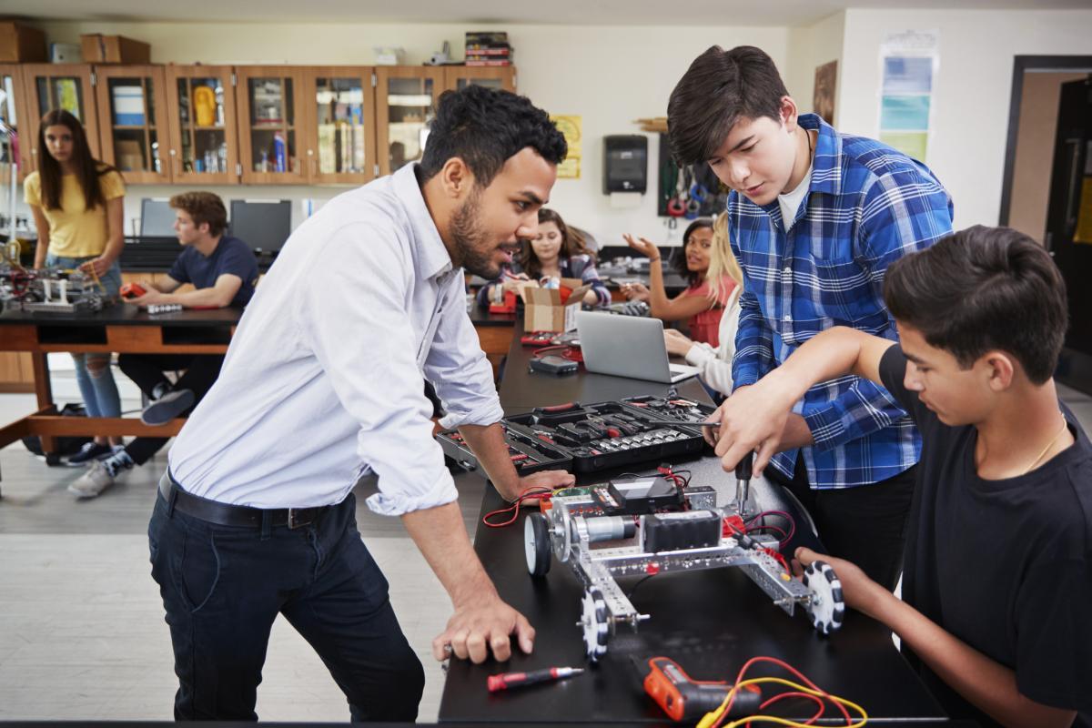 Group of people working on technology